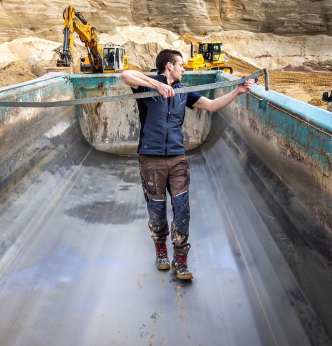 construction worker, workwear, boots, pants, truck bed